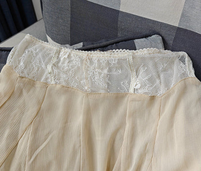 Elegant Summer Skirt Set – V-Neck Wide-Strap Top with Wavy Hem and Lace-Waist Midi Skirt for Chic Women’s Co-Ord Styling