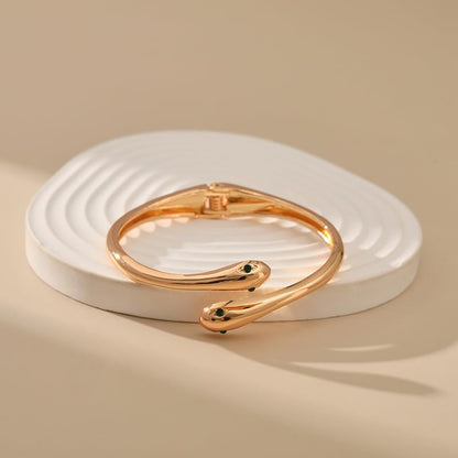 Gold-Plated Snake Bracelet with Green Zircon Eye – Fashionable Animal-Inspired Cuff Bangle for Women, Wedding Jewelry, or Bold Statement Styling