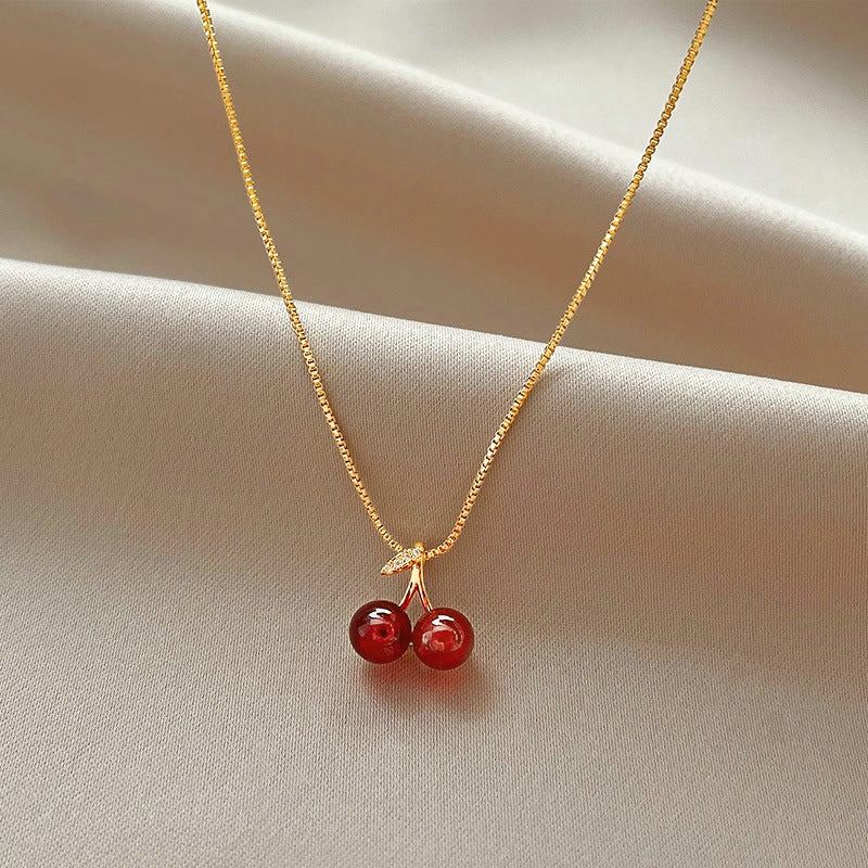 Wine Red Cherry Gold Pendant Necklace – Elegant Fashion Jewelry for Women with Personality Styling, Wedding Charm and Beautiful Birthday Gift Appeal