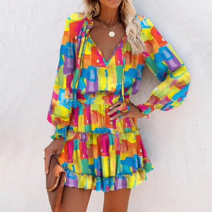 Flirty Floral Mini Patchwork Dress – Long Sleeve V-Neck Ruffle Waist for Springtime Charm