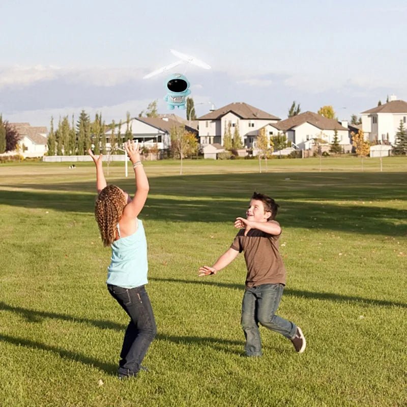 Interactive Flying Mini Astronaut Drone – Hand-Controlled Robot Toy with Lights, Perfect Outdoor Fun Gift for Kids
