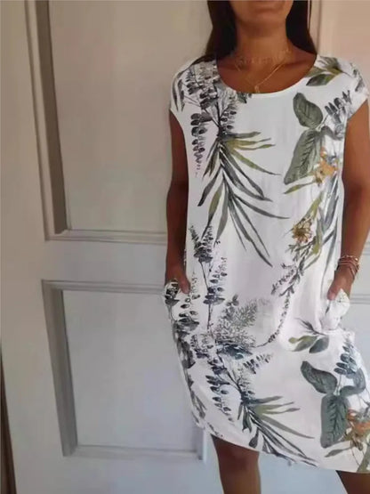 Vintage Boho Midi Dress with Flower and Leaf Print – Botanical Print Short-Sleeve Vacation Dress with Big Pockets for a Chic Beach Style