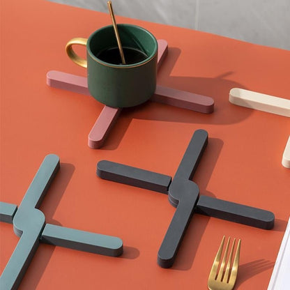 X Shaped Foldable Dining Table Mat – Heat-Resistant, Non-Slip Coaster & Plate Holder for Modern Kitchens
